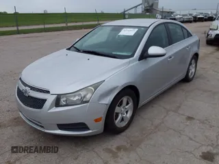 2013 Chevrolet Cruze 1LT with VIN 1G1PC5SB7D7203331, listed as a IAAI auction lot 42142672 with 189,883 mi miles and . Bid and sale history available at DreamBid. Image 2.