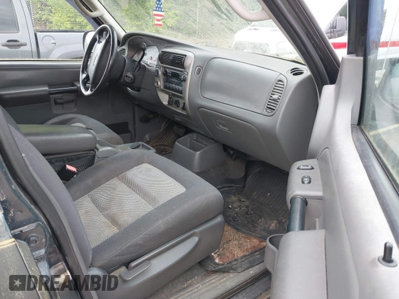2004 Ford Explorer Sport Trac XLS z VIN 1FMZU77K54UB85748, wystawiony jako IAAI lot #42389389 z przebiegiem 161 730 mil mil oraz . Historia ofert i sprzedaży dostępna na DreamBid. Obrazek 5.