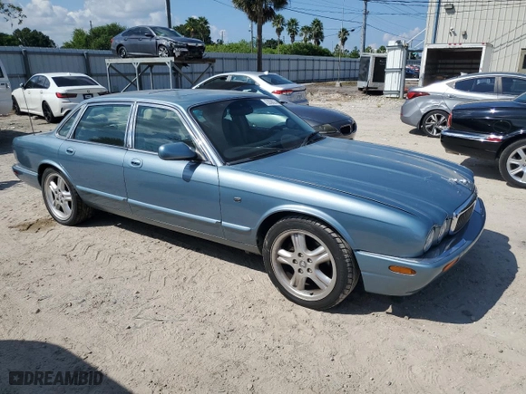 2002 Jaguar XJ with VIN SAJDA12C72LF42584, listed as a Copart auction lot 72030274 with 241,554 mi miles and Clean Title. Bid and sale history available at carsss.com. Image 4.