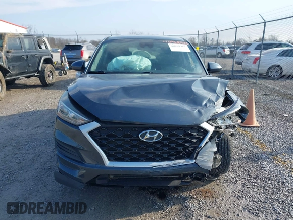 2019 Hyundai Tucson SE with VIN KM8J23A4XKU932814, listed as a IAAI auction lot 40968319 with 107,365 mi miles. Bid and sale history available at carsss.com. Image 12.