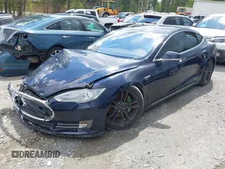 2014 Tesla Model S 60 with VIN 5YJSA1H15EFP43884, listed as a IAAI auction lot 41993180 with 78,305 mi miles and . Bid and sale history available at DreamBid. Image 16.
