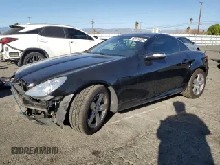 2006 Mercedes-Benz SLK-Class 3.0L with VIN WDBWK54F86F115935, listed as a Copart auction lot 88819205 with 55,947 mi miles and Salvage Title. Bid and sale history available at carsss.com. Image 1.
