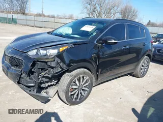 2018 Kia Sportage EX with VIN KNDPNCAC9J7324292, listed as a IAAI auction lot 41859338 with 124,519 mi miles and . Bid and sale history available at carsss.com. Image 2.
