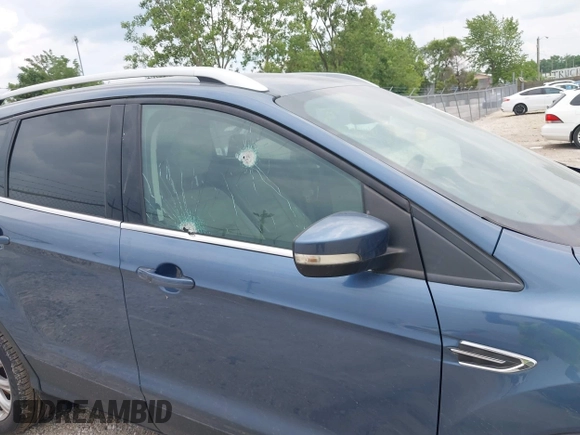 2018 Ford Escape Titanium z VIN 1FMCU0J91JUC00941, wystawiony jako IAAI lot #42679897 z przebiegiem 110 884 mil mil oraz . Historia ofert i sprzedaży dostępna na DreamBid. Obrazek 6.