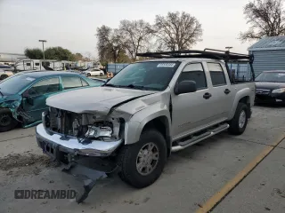 2005 GMC Canyon 1SF SLE Z71 with VIN 1GTDT136658154932, listed as a Copart auction lot 85556344 with 180,129 mi miles and Salvage Title. Bid and sale history available at carsss.com. Image 1.