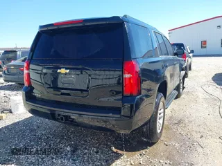 2020 Chevrolet Tahoe LS with VIN 1GNSCAKC6LR293472, listed as a IAAI auction lot 42014584 with 56,549 mi miles and . Bid and sale history available at DreamBid. Image 4.