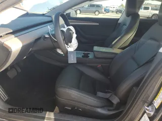 2023 Tesla Model 3 with VIN 5YJ3E1EA9PF714646, listed as a Copart auction lot 51551455 with 29,611 mi miles and Salvage Title. Bid and sale history available at DreamBid. Image 7.