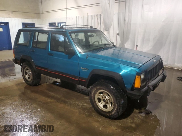 1994 Jeep Cherokee Sport with VIN 1J4FJ68S5RL109124, listed as a Copart auction lot 85524644 with 369,388 mi miles and Salvage title. Bid and sale history available at DreamBid. Image 4.
