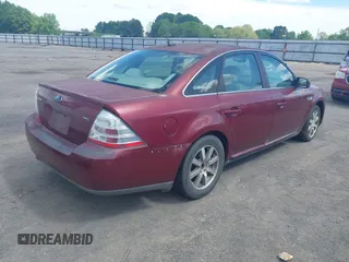2008 Ford Taurus SEL z VIN 1FAHP24W68G132701, wystawiony jako IAAI lot #41928871 z przebiegiem 385 163 mil mil oraz . Historia ofert i sprzedaży dostępna na DreamBid. Obrazek 4.