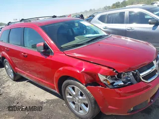 2009 Dodge Journey SXT with VIN 3D4GG57V39T522388, listed as a IAAI auction lot 41909709 with 208,738 mi miles. Bid and sale history available at carsss.com. Image 6.