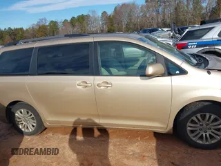 2011 Toyota Sienna XLE AAS with VIN 5TDYK3DCXBS117023, listed as a IAAI auction lot 41581785 with 216,341 mi miles. Bid and sale history available at carsss.com. Image 13.