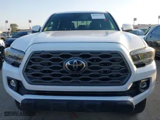 2023 Toyota Tacoma 4WD SR with VIN 3TMCZ5AN4PM541165, listed as a IAAI auction lot 41651949 with 43,074 mi miles. Bid and sale history available at carsss.com. Image 6.