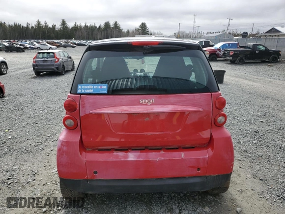 2011 Smart fortwo Pure z VIN WMEEJ3BA5BK487747, wystawiony jako Copart lot #49703445 z przebiegiem 93 489 mil mil oraz Szkoda całkowita • Salvage title. Historia ofert i sprzedaży dostępna na DreamBid. Obrazek 6.