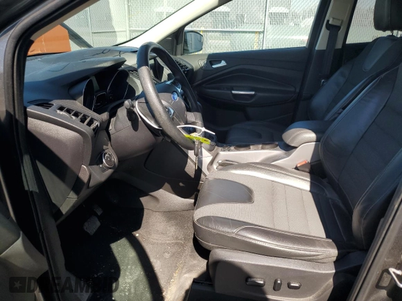 2016 Ford Escape SE z VIN 1FMCU9G96GUB76771, wystawiony jako Copart lot #59188375 z przebiegiem 167 300 mil mil oraz Szkoda całkowita • Salvage title. Historia ofert i sprzedaży dostępna na DreamBid. Obrazek 7.