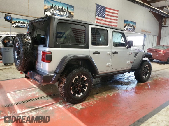 2024 Jeep Wrangler Rubicon with VIN 1C4PJXFG8RW355730, listed as a Copart auction lot 47982545 with 2,279 mi miles and Salvage title. Bid and sale history available at DreamBid. Image 3.