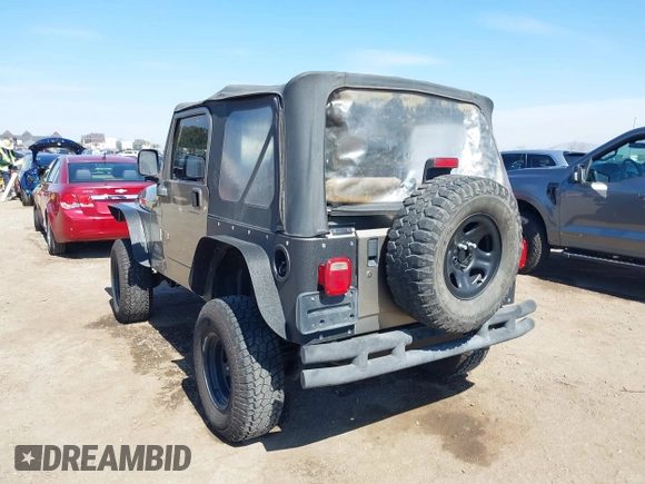 2005 Jeep Wrangler Sport with VIN 1J4FA49S65P342497, listed as a IAAI auction lot 41674606 with 123,457 mi miles. Bid and sale history available at carsss.com. Image 3.