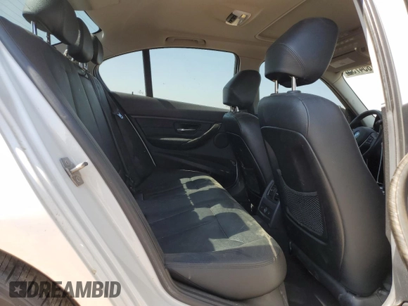 2013 BMW 3 Series 328i xDrive with VIN WBA3B3C51DF532714, listed as a Copart auction lot 57854735 with 140,650 mi miles and Salvage title. Bid and sale history available at DreamBid. Image 10.
