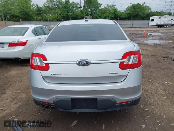2012 Ford Taurus SEL z VIN 1FAHP2EW1CG132855, wystawiony jako IAAI lot #42256022 z przebiegiem 177 749 mil mil oraz . Historia ofert i sprzedaży dostępna na DreamBid. Obrazek 16.