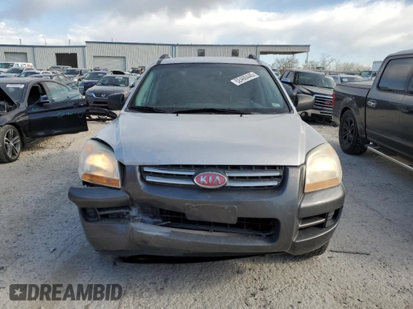 2005 Kia Sportage LX with VIN KNDJF723457132535, listed as a Copart auction lot 52460445 with 180,110 mi miles and Salvage Title. Bid and sale history available at carsss.com. Image 5.