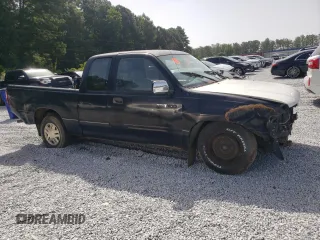 1995 Toyota T100 DX z VIN JT4VD12E4S0008162, wystawiony jako Copart lot #65768104 z przebiegiem 404 762 mil mil oraz Nie do naprawy. Historia ofert i sprzedaży dostępna na DreamBid. Obrazek 4.