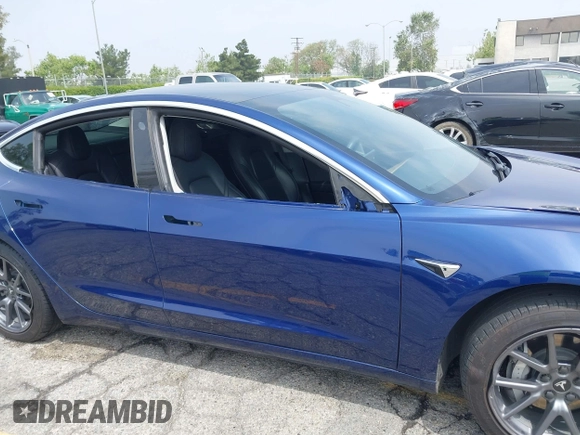 2020 Tesla Model 3 Standard Range Plus z VIN 5YJ3E1EA8LF785010, wystawiony jako IAAI lot #42130951 z przebiegiem 90 072 mil mil oraz . Historia ofert i sprzedaży dostępna na DreamBid. Obrazek 21.