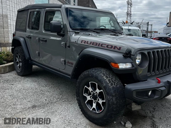 2022 Jeep Wrangler Unlimited Rubicon z VIN 1C4HJXFNXNW745921, wystawiony jako Copart lot #60096775 z przebiegiem 100 mil mil oraz Czysty tytuł • Clean title. Historia ofert i sprzedaży dostępna na DreamBid. Obrazek 1.