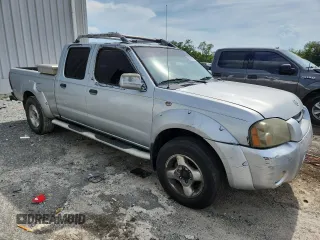 2002 Nissan Frontier XE with VIN 1N6ED29X82C340808, listed as a Copart auction lot 63927075 with 306,615 mi miles and Clean title. Bid and sale history available at DreamBid. Image 4.