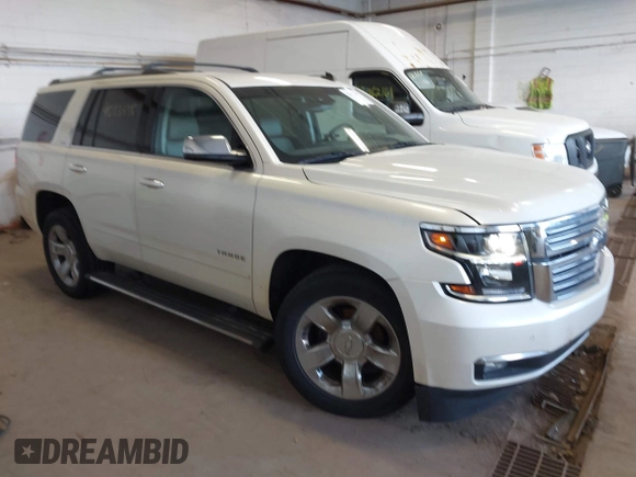 2015 Chevrolet Tahoe LTZ with VIN 1GNSKCKC9FR123996, listed as a IAAI auction lot 42113435 with 149,825 mi miles and . Bid and sale history available at DreamBid. Image 1.