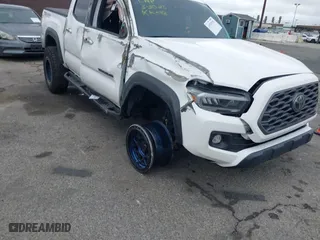 2023 Toyota Tacoma 4WD SR with VIN 3TMCZ5AN0PM550641, listed as a IAAI auction lot 41929355 with 18,917 mi miles. Bid and sale history available at carsss.com. Image 1.