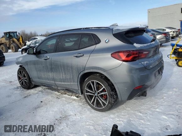 2022 BMW X2 xDrive28i with VIN WBXYJ1C03N5U59814, listed as a Copart auction lot 86088784 with 60,787 mi miles and Salvage Title. Bid and sale history available at carsss.com. Image 2.