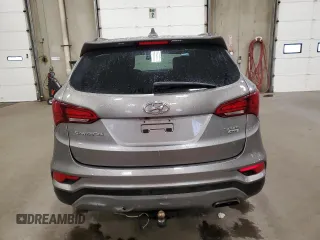 2018 Hyundai Santa Fe 2.4L with VIN 5NMZUDLB5JH096340, listed as a Copart auction lot 61038095 with 114,993 mi miles and Salvage title. Bid and sale history available at DreamBid. Image 6.