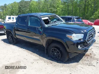 2022 Toyota Tacoma SR with VIN 3TMCZ5AN6NM470192, listed as a IAAI auction lot 42063781 with 32,752 mi miles and . Bid and sale history available at DreamBid. Image 1.