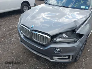 2014 BMW X5 xDrive35i with VIN 5UXKR0C52E0K50710, listed as a IAAI auction lot 40529606 with 114,307 mi miles. Bid and sale history available at carsss.com. Image 6.