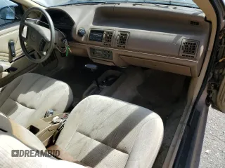 1989 Ford Tempo z VIN 1FAPP31X0KK113919, wystawiony jako Copart lot #76599314 z przebiegiem 65 823 mil mil oraz Tytuł czysty. Historia ofert i sprzedaży dostępna na DreamBid. Obrazek 8.