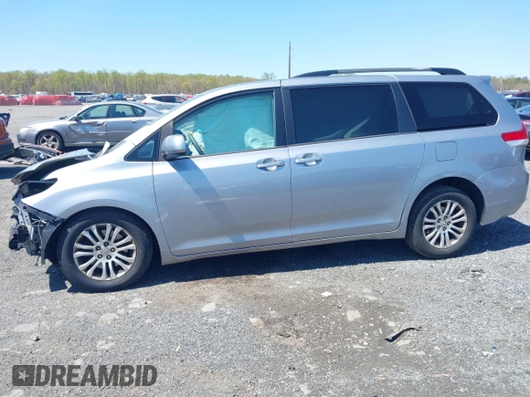 2013 Toyota Sienna XLE AAS with VIN 5TDYK3DC7DS299024, listed as a IAAI auction lot 42055130 with 349,520 mi miles. Bid and sale history available at carsss.com. Image 14.