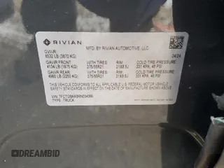 2024 Rivian R1T Adventure with VIN 7FCTGBAA8RN034399, listed as a Copart auction lot 86857044 with 8,176 mi miles and Salvage Title. Bid and sale history available at carsss.com. Image 12.