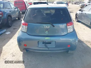 2012 Scion iQ with VIN JTNJJXB09CJ019082, listed as a IAAI auction lot 41798707 with 120,628 mi miles. Bid and sale history available at carsss.com. Image 17.