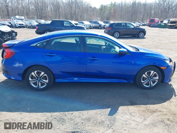 2017 Honda Civic LX z VIN 19XFC2F54HE203525, wystawiony jako IAAI lot #41796081 z przebiegiem 82 910 mil mil oraz . Historia ofert i sprzedaży dostępna na DreamBid. Obrazek 13.