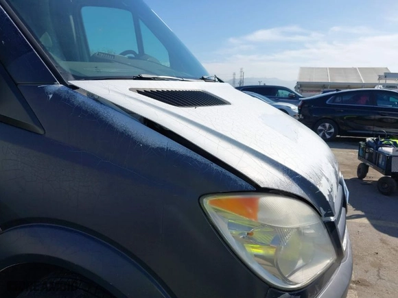 2013 Mercedes-Benz Sprinter Cargo Vans with VIN WD3PE8CC8D5742900, listed as a IAAI auction lot 41764698 with 310,185 mi miles. Bid and sale history available at carsss.com. Image 6.