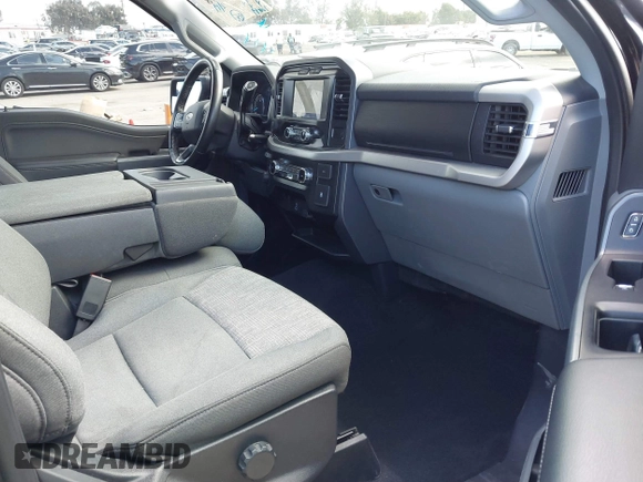 2022 Ford F-150 XL with VIN 1FTMF1E56NKE03194, listed as a IAAI auction lot 41620978 with 76,689 mi miles and . Bid and sale history available at DreamBid. Image 5.