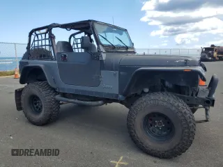 1990 Jeep Wrangler with VIN 2J4FY29T5LJ537896, listed as a Copart auction lot 57021295 with 143,753 mi miles and Clean title. Bid and sale history available at DreamBid. Image 4.