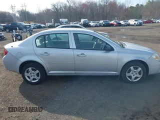 2007 Chevrolet Cobalt LS with VIN 1G1AK55F777301061, listed as a IAAI auction lot 41899079 with 148,197 mi miles and . Bid and sale history available at DreamBid. Image 13.