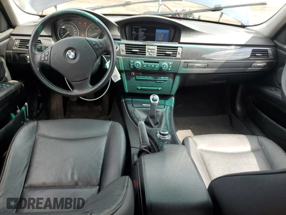 2009 BMW 3 Series 328i with VIN WBAPH73569A171010, listed as a Copart auction lot 61923715 with 209,062 mi miles and Salvage title. Bid and sale history available at DreamBid. Image 8.