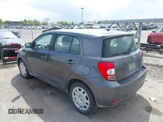 2010 Scion xD with VIN JTKKU4B42A1001367, listed as a IAAI auction lot 42085217 with 120,359 mi miles. Bid and sale history available at carsss.com. Image 3.