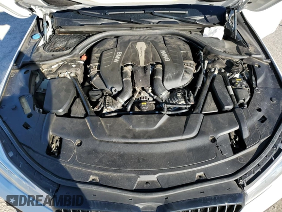 2017 BMW 7 Series 750i with VIN WBA7F0C39HGM22030, listed as a Copart auction lot 87127484 with 110,634 mi miles and Salvage title. Bid and sale history available at DreamBid. Image 11.