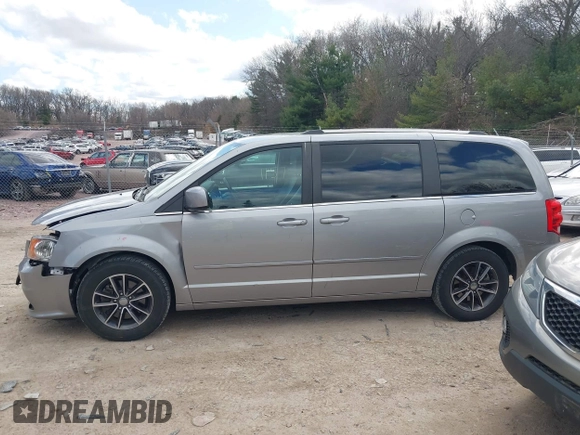 2017 Dodge Grand Caravan SXT with VIN 2C4RDGCG6HR671199, listed as a IAAI auction lot 42031157 with 99,189 mi miles and . Bid and sale history available at DreamBid. Image 14.