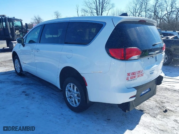 2023 Chrysler Voyager LX with VIN 2C4RC1CG7PR564936, listed as a IAAI auction lot 41356028 with 36,834 mi miles. Bid and sale history available at carsss.com. Image 3.
