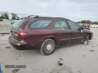 2000 Mercury Sable LS Premium z VIN 1MEFM59S1YA600756, wystawiony jako Copart lot #78743334 z przebiegiem 163 595 mil mil oraz Szkody całkowita. Historia ofert i sprzedaży dostępna na DreamBid. Obrazek 3.