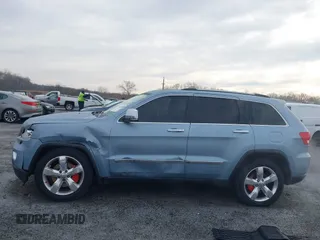 2013 Jeep Grand Cherokee Overland with VIN 1C4RJFCT2DC572978, listed as a IAAI auction lot 41468915 with 223,528 mi miles. Bid and sale history available at carsss.com. Image 14.