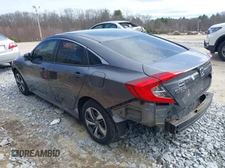 2020 Honda Civic LX with VIN 2HGFC2F6XLH509250, listed as a IAAI auction lot 41904206 with 52,583 mi miles and . Bid and sale history available at DreamBid. Image 3.